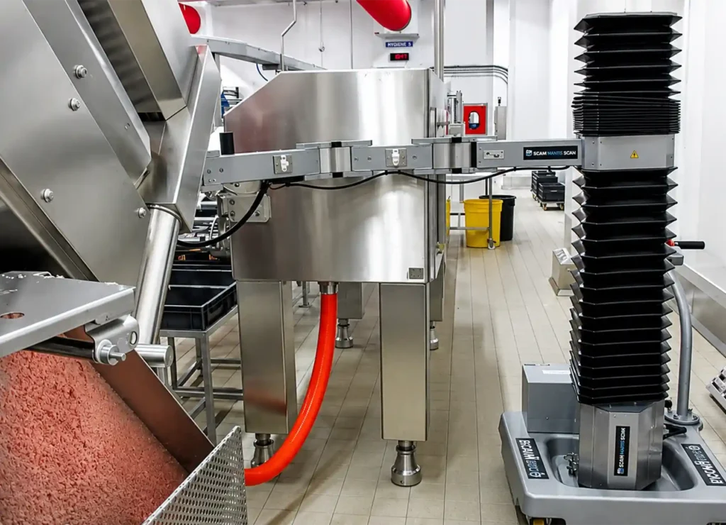 Manipulator Lebensmittelindustrie - Handhabung von Schneidklingen für Schinken mit dem SCARA Manipulatorarm